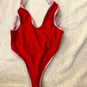 Red one piece thong swimsuit